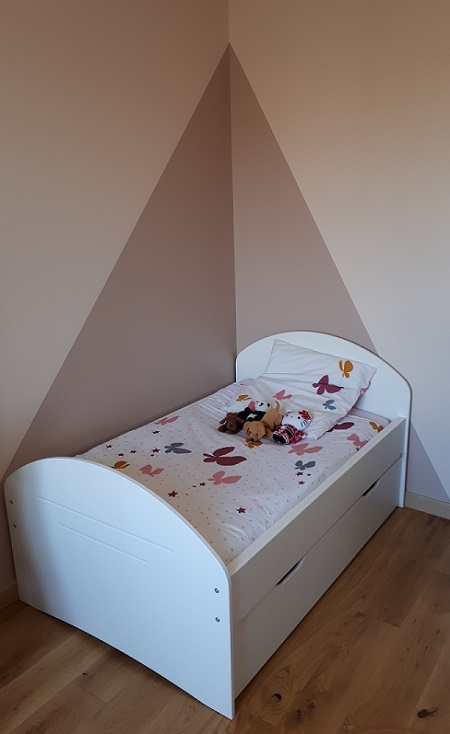 Le lit enfant évolutif Spoom blanc avec tiroir de lit